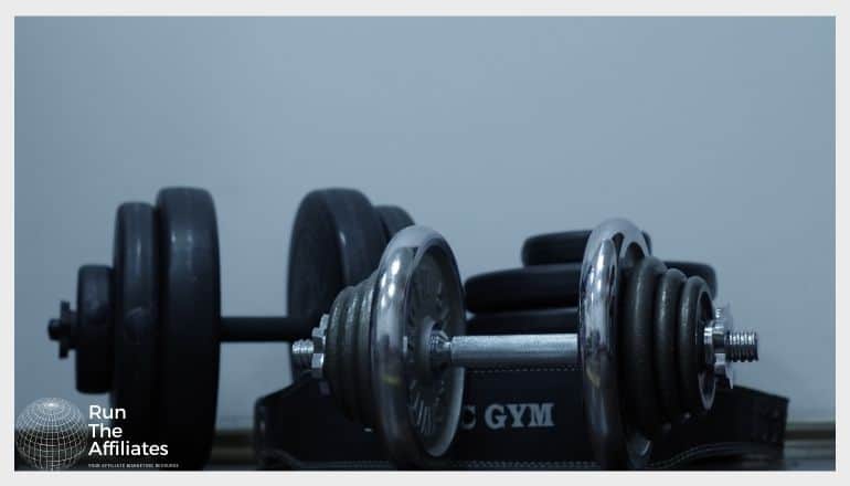 dumbells resting on the ground