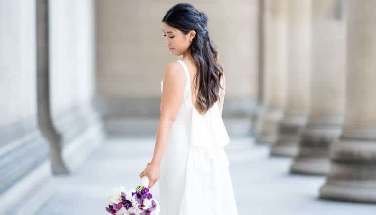 bride holding flowers