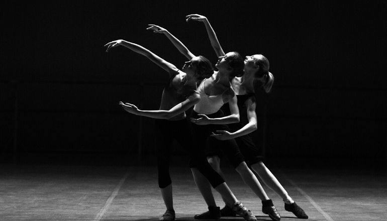 woman in black dancing