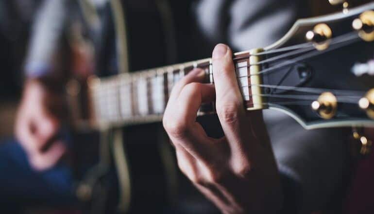 man playing guitar