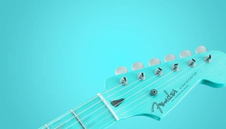 light blue fender guitar