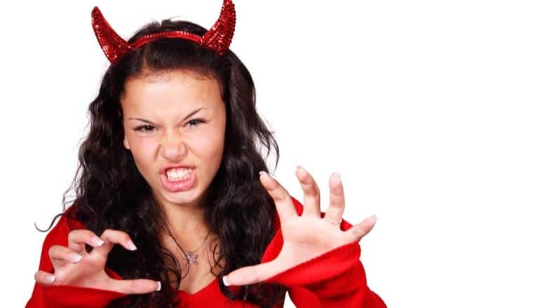 woman dressed as devil