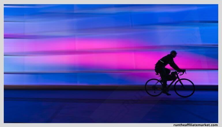 cyclist in neon lights