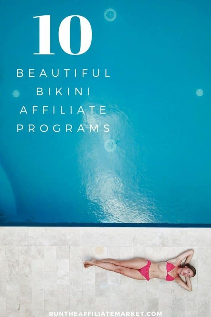 overhead view of woman in a pink bikini laying next to a deep blue swimming pool