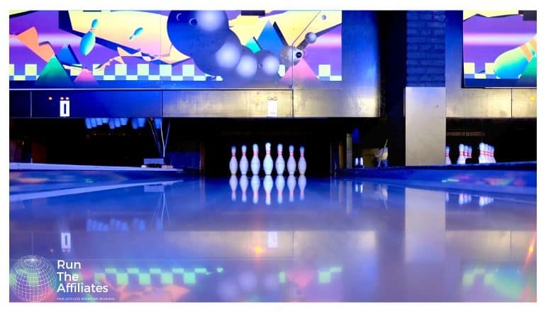 bowling alley lit with purple light