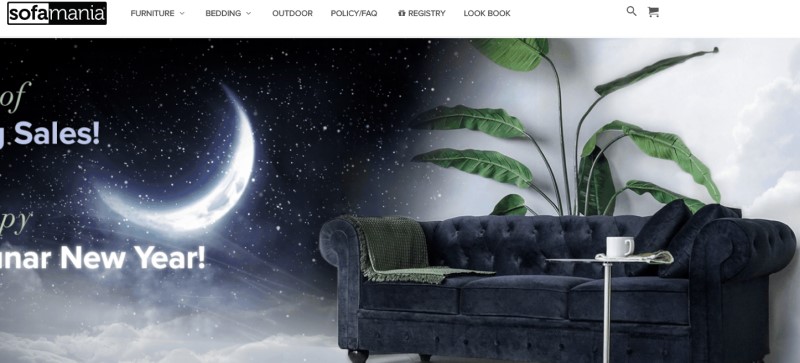 screenshot of the sofa mania website featuring a blue sofa with green blankets adorning it