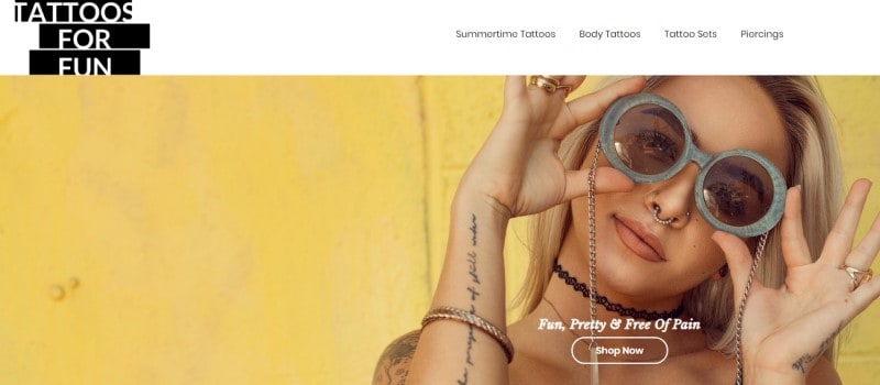 screenshot of the tattoos for fun website featuring a blonde model with temporary tattoos and wearing sunglasses