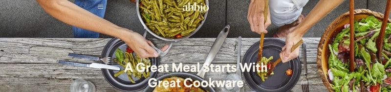 screenshot of the abbio website featuring a group of people preparing a meal