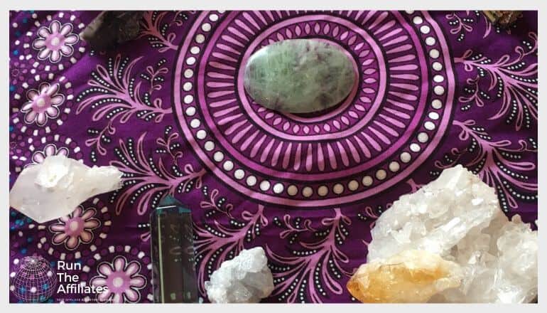 healing crystals on an ornate purple cloth