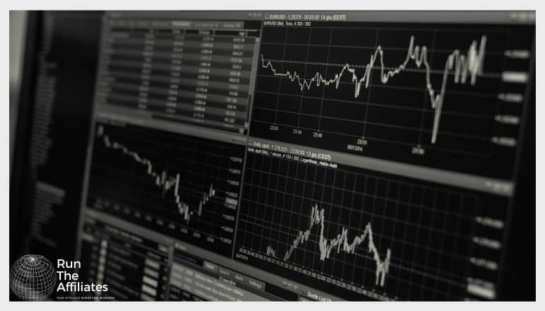 computer monitor with Forex infomraion, charts and graphs in black and white
