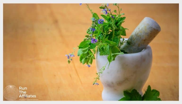 mortar and pestle with herbs init