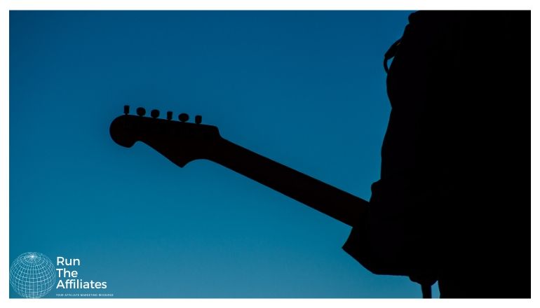 silhouette of a man with a guitar