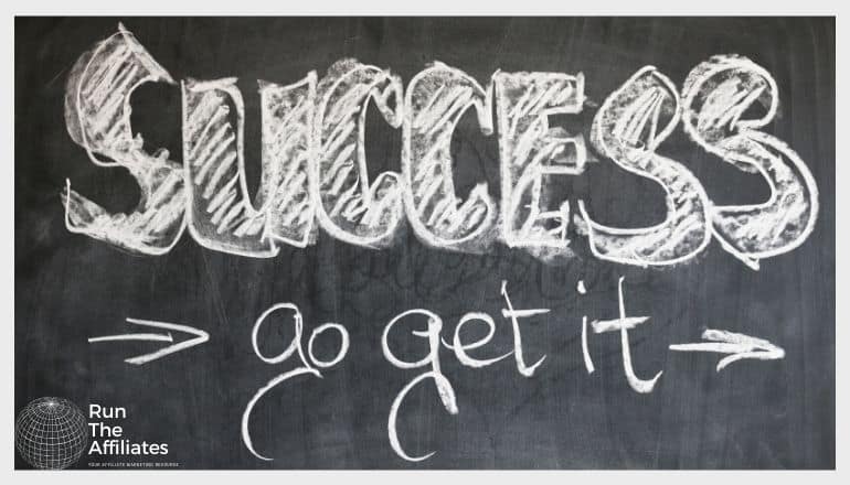 blackboard with success go get it written in chalk