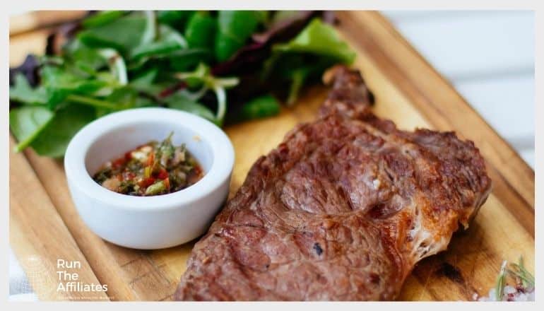 meat with salad on a serving dish