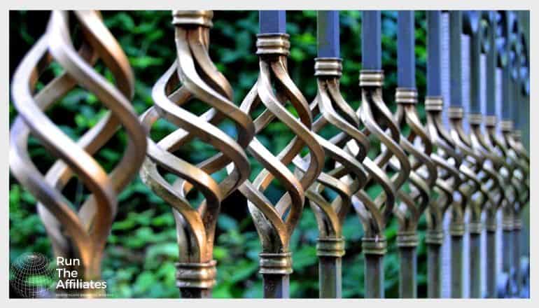 metal art fence posts with corkscrewed metal