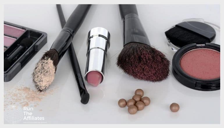 various cosmetic brushes and pads on a table