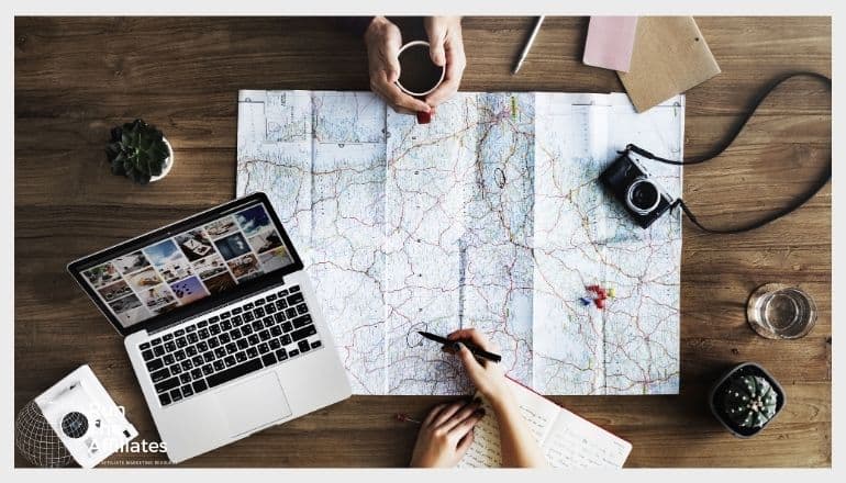 man looking at a map on a table