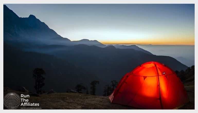 tent illuminated from inside at dusk