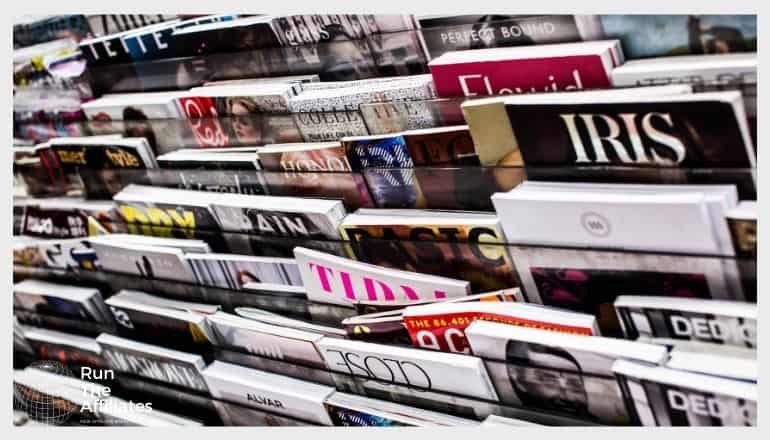 magazines on a rack in a store