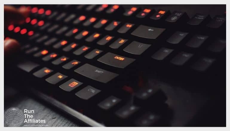 close up of a keyboard with orange led lights