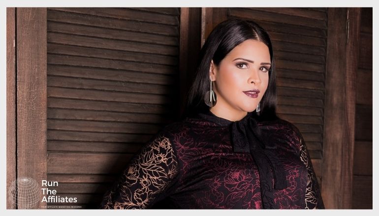 woman with dark hair modeling plus size clothing