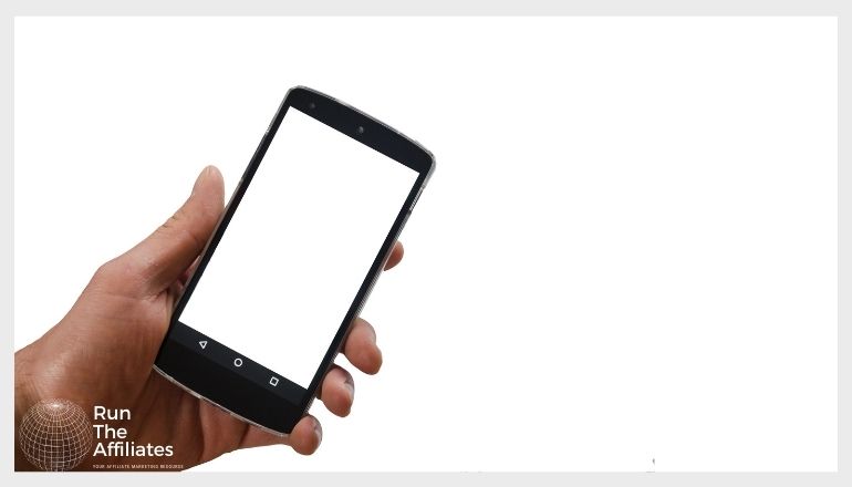 man holding a smartphone against a white background