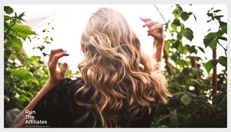 woman in a field of tall plants